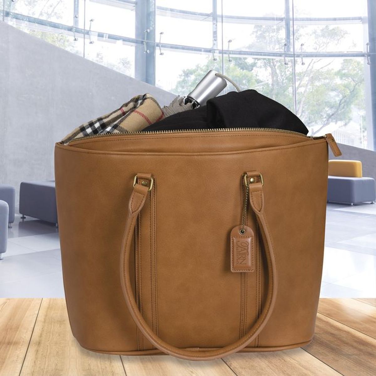 Our stylish and durable leatherette KAPS... Koozie Group